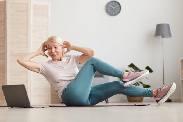 Woman doing exercises at home