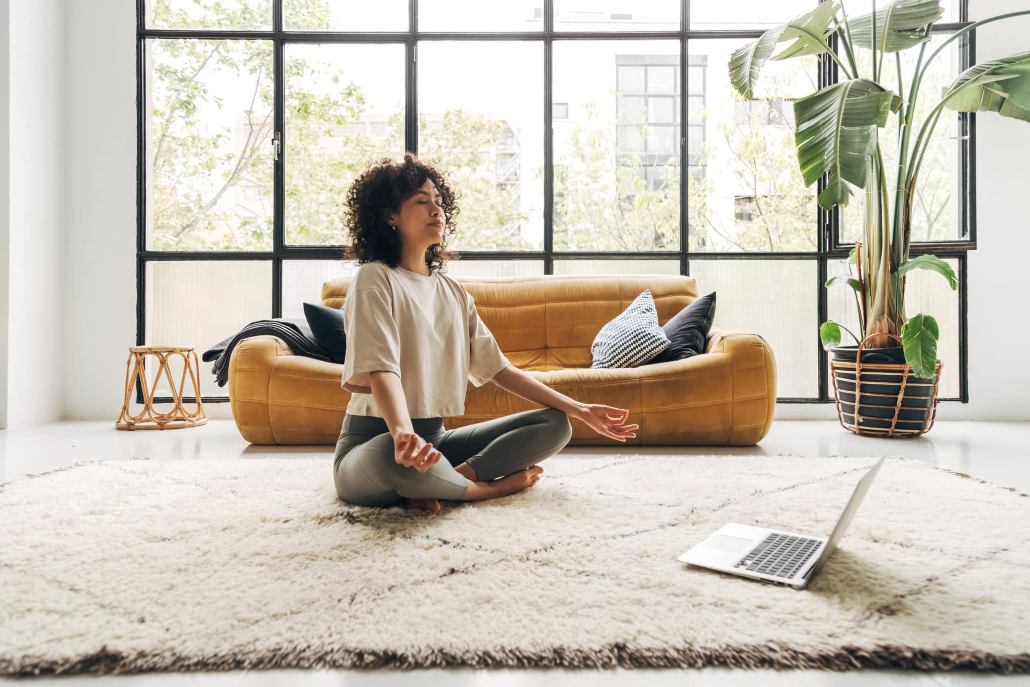 young woman woman meditating at home